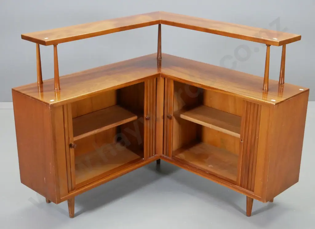 mid-century mahogany corner cabinet with top shelf, 2 cupboards w/ double tambour doors, one handle missing Image 1++