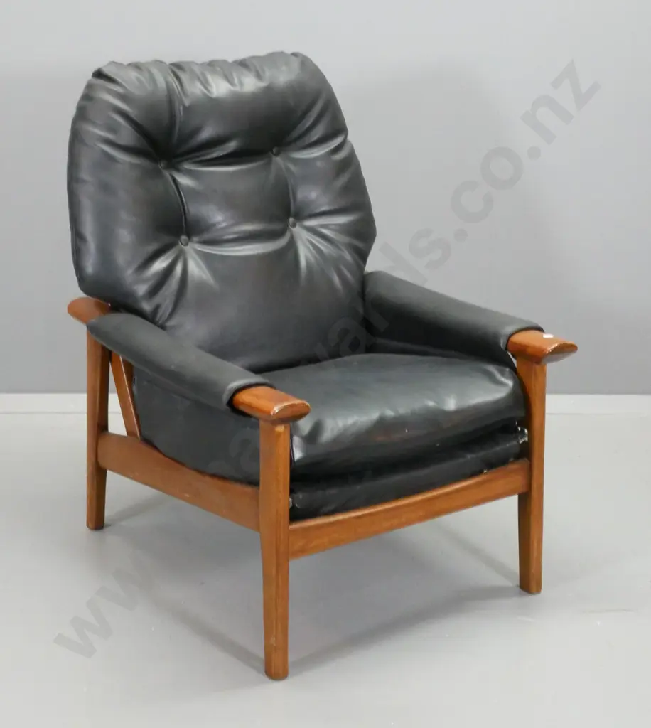 mid-century mahogany framed & black vinyl "Lubeck" chair made by Broadhead Bros Auckland - small tear to vinyl Image 1++