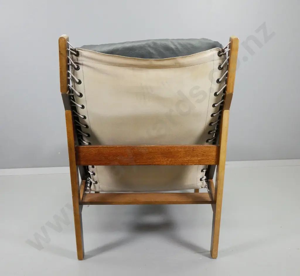 mid-century deep buttoned 'supelle' vinyl upholstered sling back chair w/ leather strap arms - damage to back of cushion Image 1++