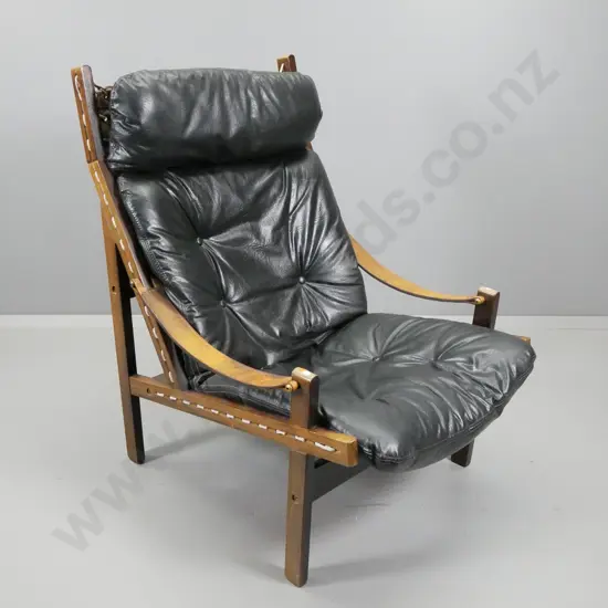 mid-century deep buttoned 'supelle' vinyl upholstered sling back chair w/ leather strap arms - damage to back of cushion