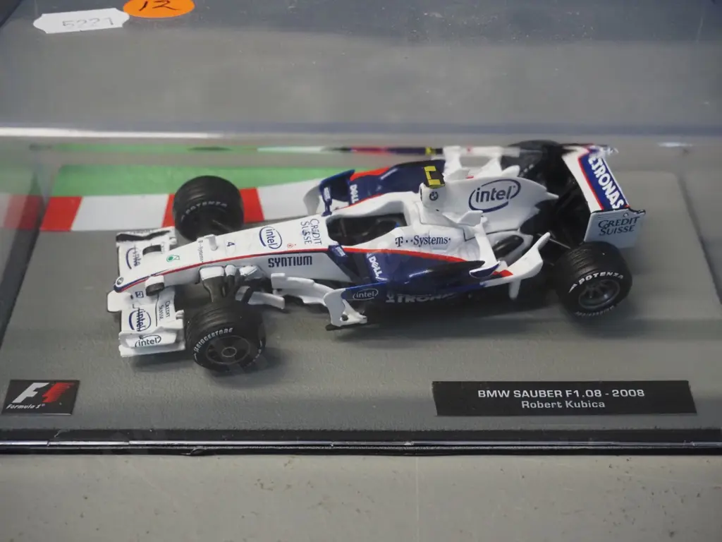 3 die-cast 1:43 scale Formula 1 racing cars - 2004 Rubens Varrcello, 2004 Felipe Massa, 2008 Robert Kubica Image 1++