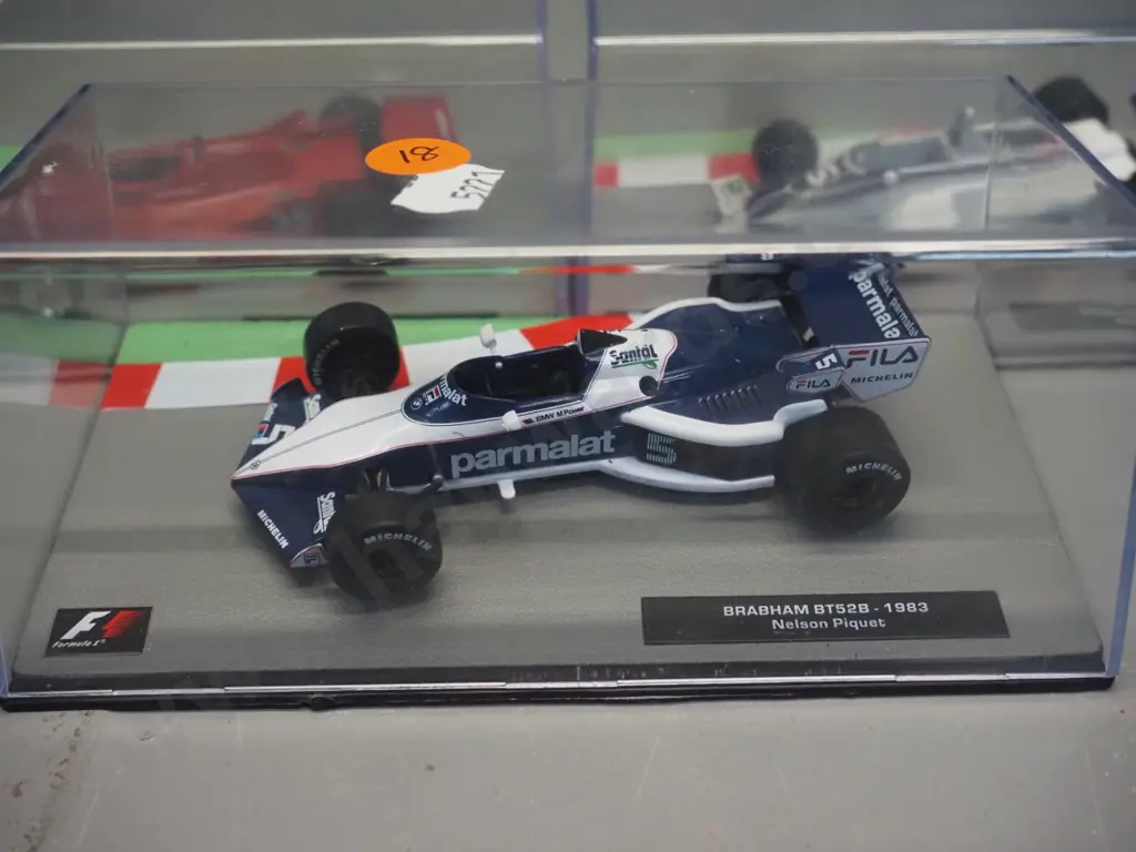 3 die-cast 1:43 scale Formula 1 racing cars - 1979 Bruno Giacomelli, 1981 and 1983 Nelson Piquet Image 1++
