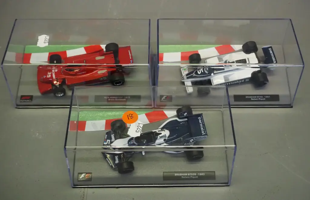 3 die-cast 1:43 scale Formula 1 racing cars - 1979 Bruno Giacomelli, 1981 and 1983 Nelson Piquet Image 1++