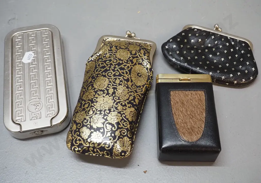 leather glasses case and coin purse both marked Made in Italy, a leather cigarette case with fur insert, & a Rolls Razor Image 1++