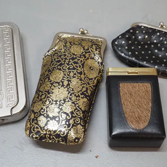 leather glasses case and coin purse both marked Made in Italy, a leather cigarette case with fur insert, & a Rolls Razor