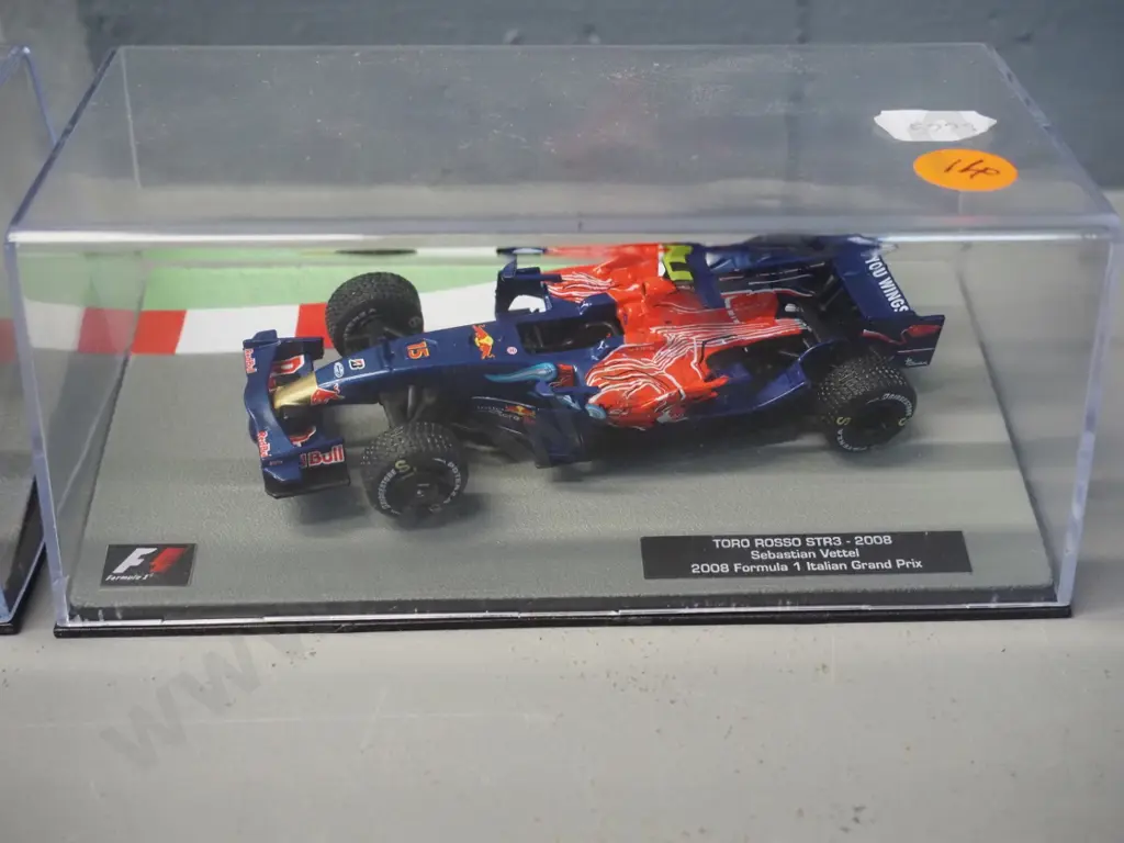 3 die-cast 1:43 scale Formula 1 racing cars - 2008 Lewis Hamilton, 2008 Sebastian Vettel, 2009 Jason Button Image 1++