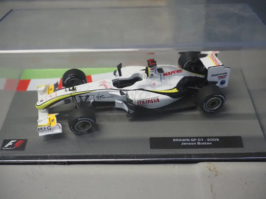 3 die-cast 1:43 scale Formula 1 racing cars - 2008 Lewis Hamilton, 2008 Sebastian Vettel, 2009 Jason Button Image 1++