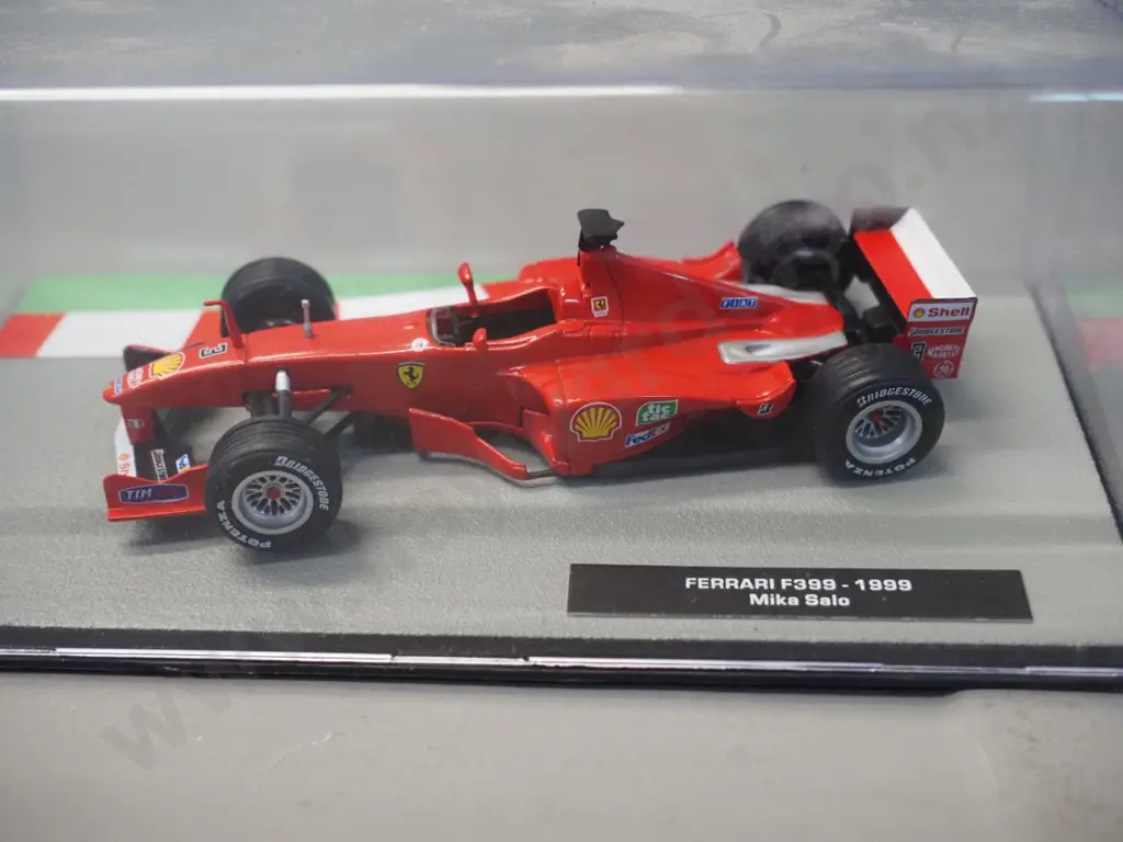 3 die-cast 1:43 scale Formula 1 racing cars - 1999 Mika Hakkinen, 1999 Mika Salo, 2002 Michael Schumacher, Image 1++