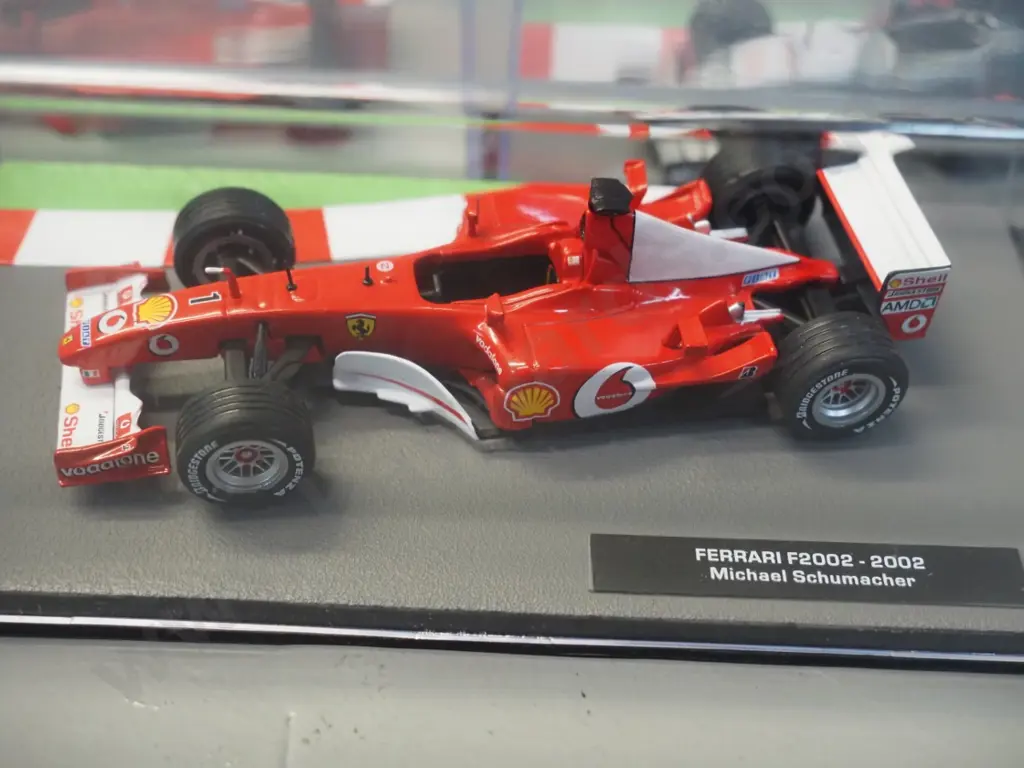 3 die-cast 1:43 scale Formula 1 racing cars - 1999 Mika Hakkinen, 1999 Mika Salo, 2002 Michael Schumacher, Image 1++