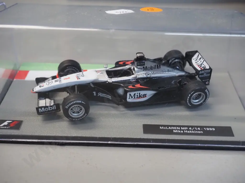 3 die-cast 1:43 scale Formula 1 racing cars - 1999 Mika Hakkinen, 1999 Mika Salo, 2002 Michael Schumacher, Image 1++