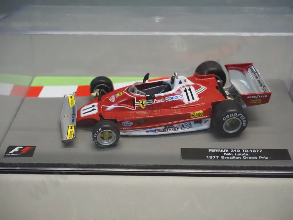 3 die-cast 1:43 scale Formula 1 racing cars - 1973 Jackie Stewart, 1975 Carlos Pace, 1977 Niki Lauder Image 1++