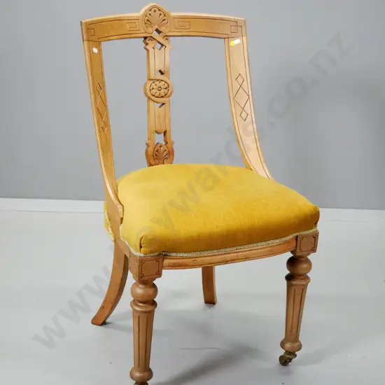 vintage walnut dining chair with carved back, original casters on front, gold velvet fabric on seat H900 W480 D530