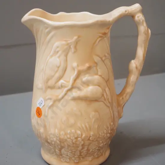 Arthur Wood kingfisher relief pattern pottery jug - small manufacturing fault on top of handle H210