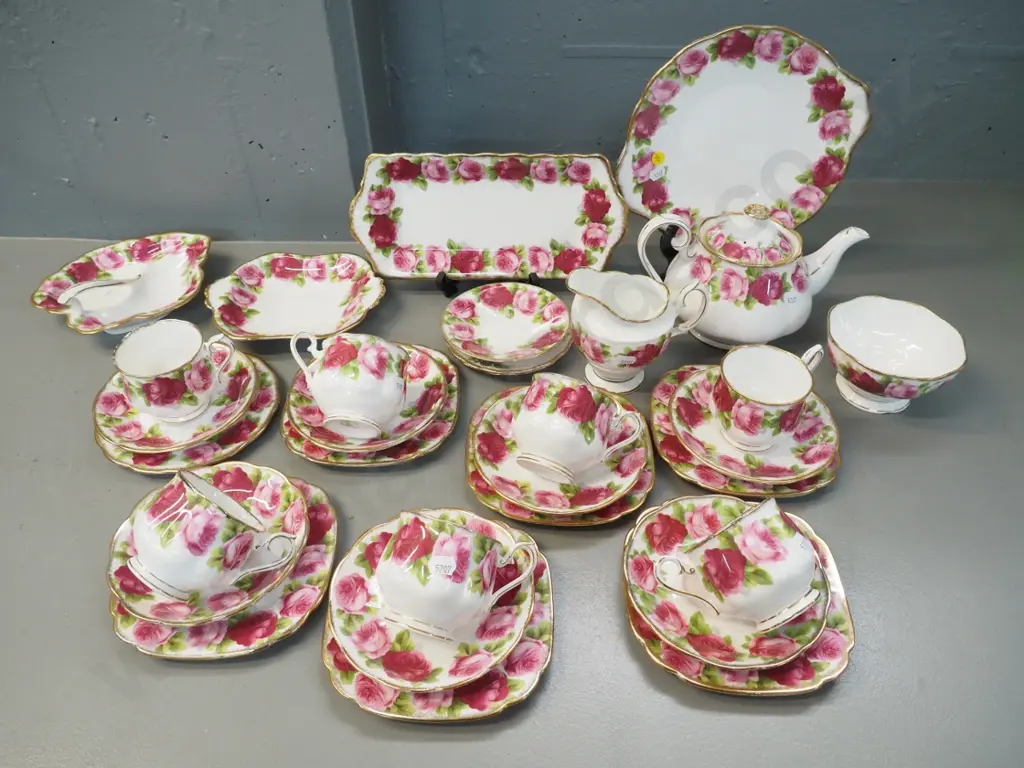 Royal Albert Old English Roses teaware including teapot, cream & sugar, 7 trios serving dishes, etc. Image 1++