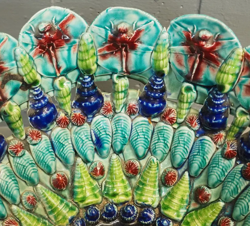 large majolica style pottery bowl with shell and dragonly motifs - has obvious repair H-210 D-330 Image 1++