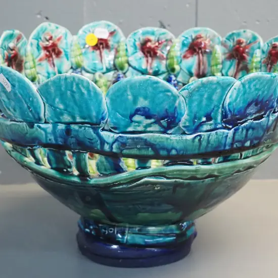 large majolica style pottery bowl with shell and dragonly motifs - has obvious repair H-210 D-330