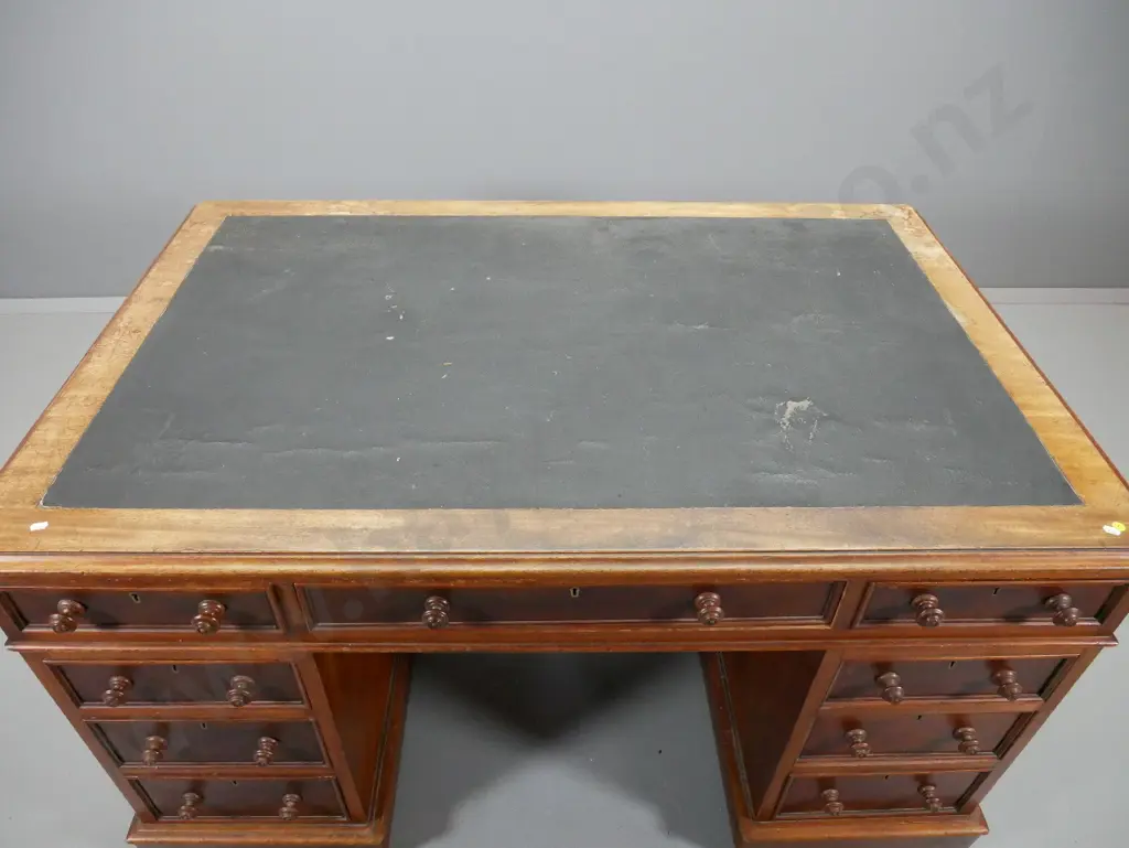 antique mahogany 9-drawer double pedestal desk w/key escutcheons & locks, wear to leatherette top, polish Image 1++