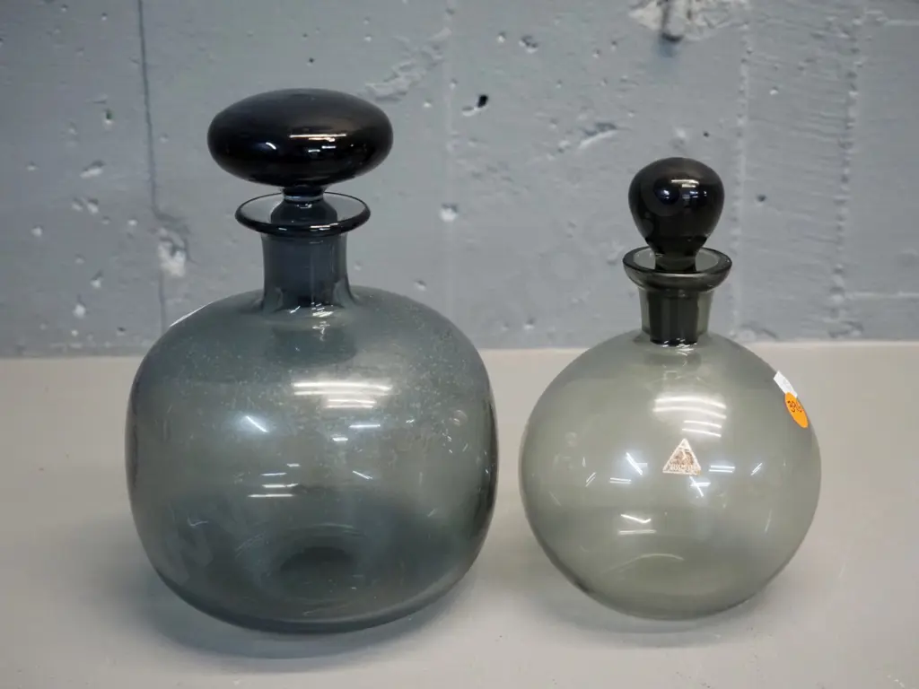 2 smoked glass stoppered bottles - larger H200, other has Sussmuth label, both need cleaning inside Image 1++