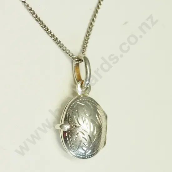silver small locket stamped 925