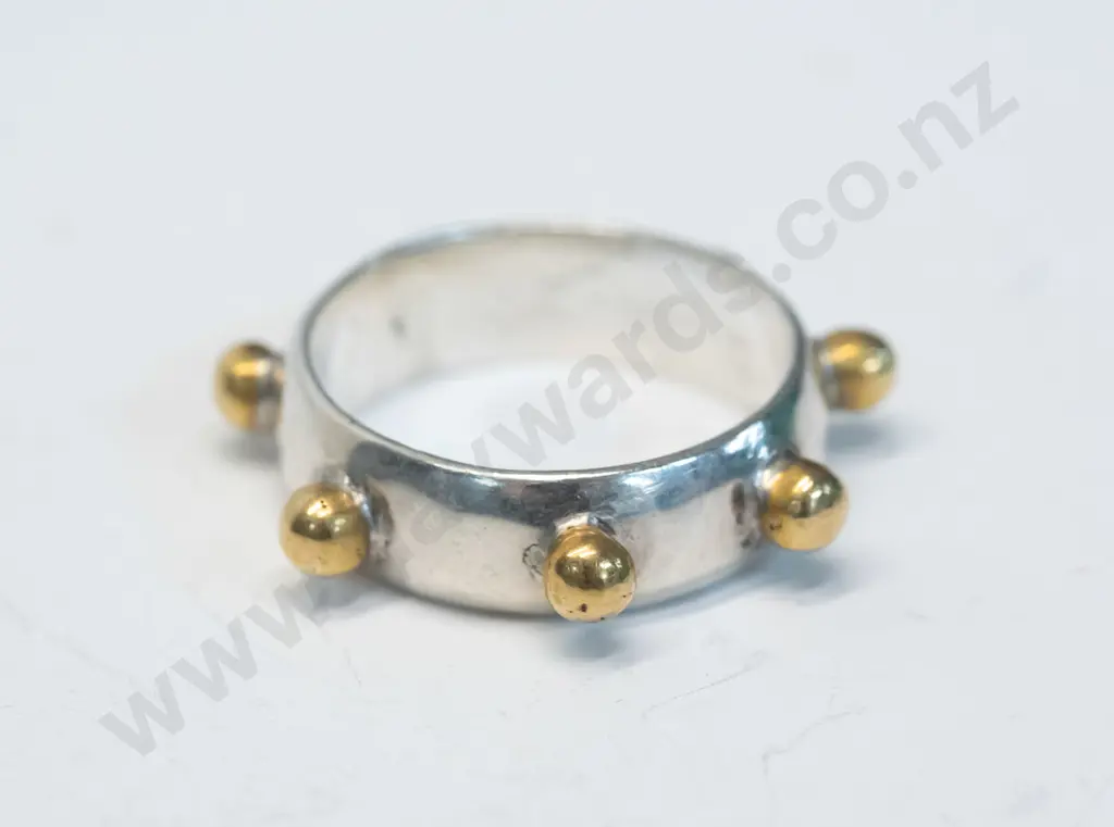 silver ring with 7 gold coloured knobs no mark Image 1++