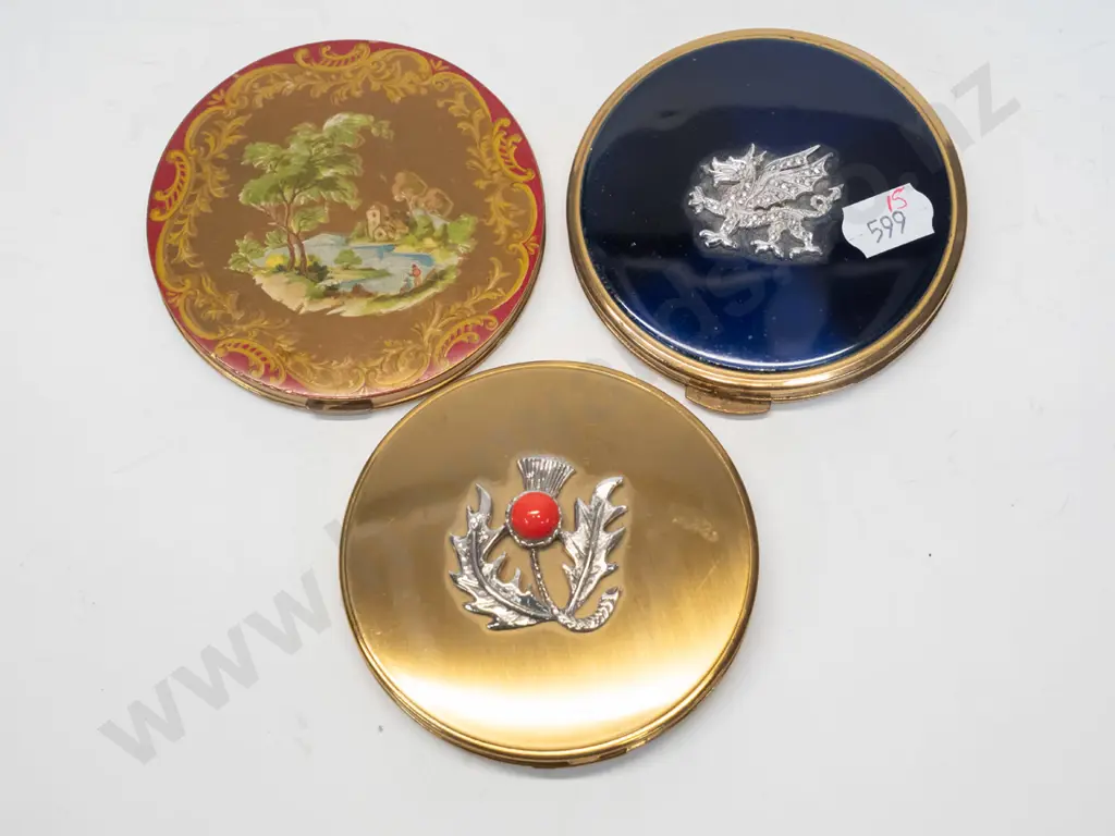 3 powder compacts - 1 with thistle, 1 with dragon, 1 with country scene also mirror is broken Image 1++
