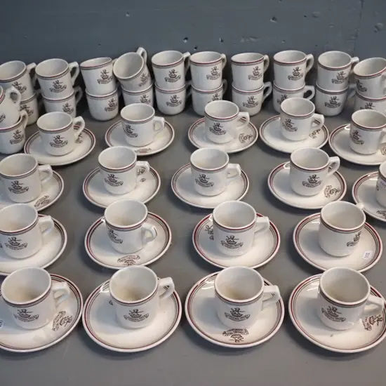 large quantity of Crown Lynn espresso cups & saucers with Invercargill Licensing Trust logo - 40 cups & 18 saucers