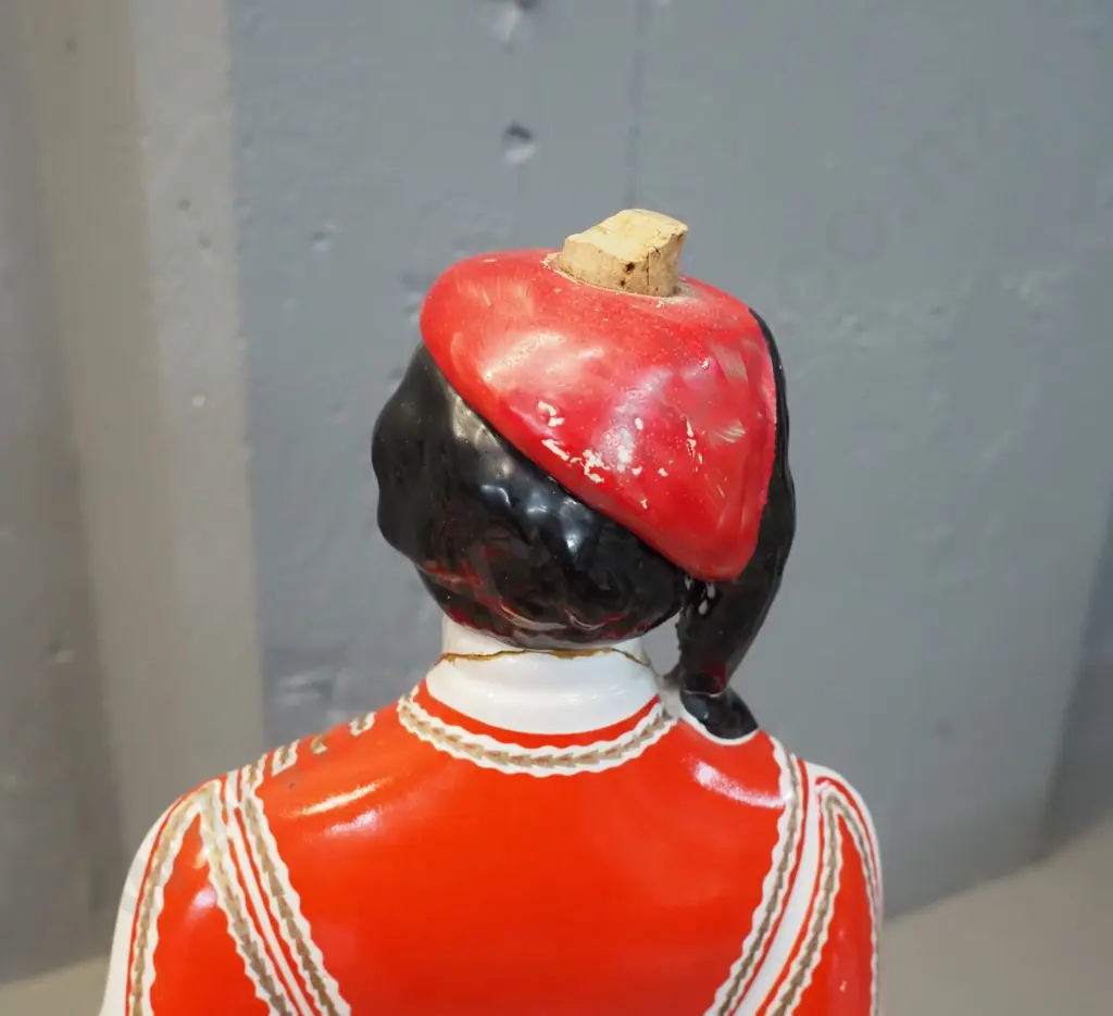 pair of Italian ceramic figural decanters - Metaxa / Ouzo female H470 and male has repair to neck Image 1++