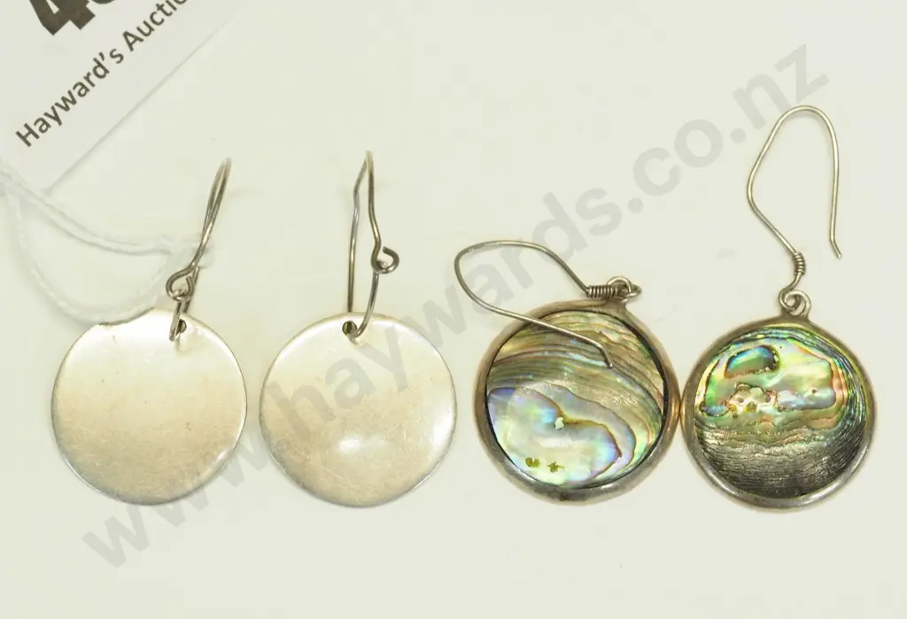 2 pairs of silver earrings, one with paua shell, both stamped 925 Image 1++