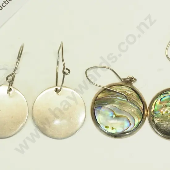 2 pairs of silver earrings, one with paua shell, both stamped 925