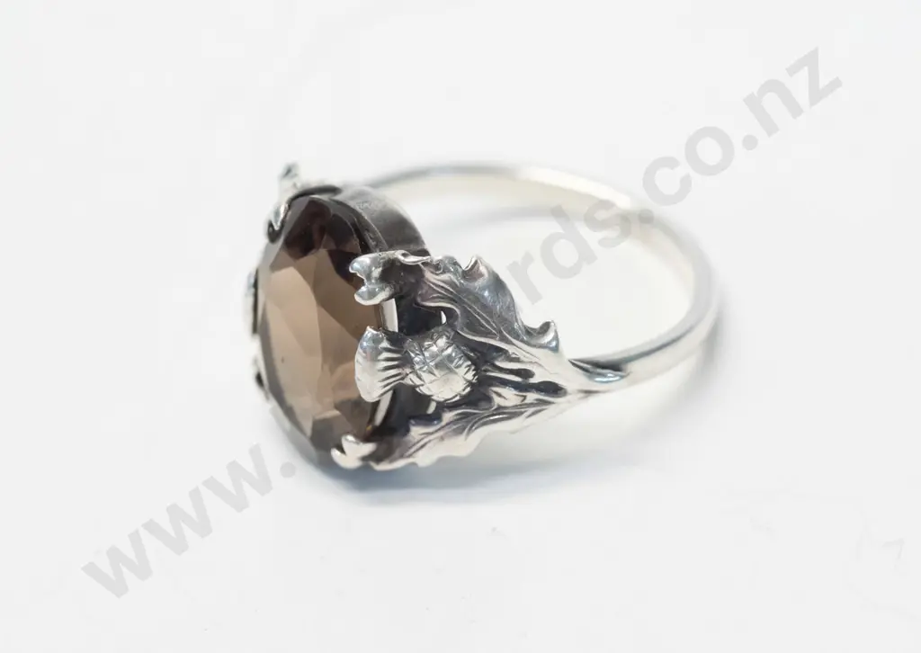 silver amber coloured stone ring with Scottish thistles on bridge stamped 925 Image 1++
