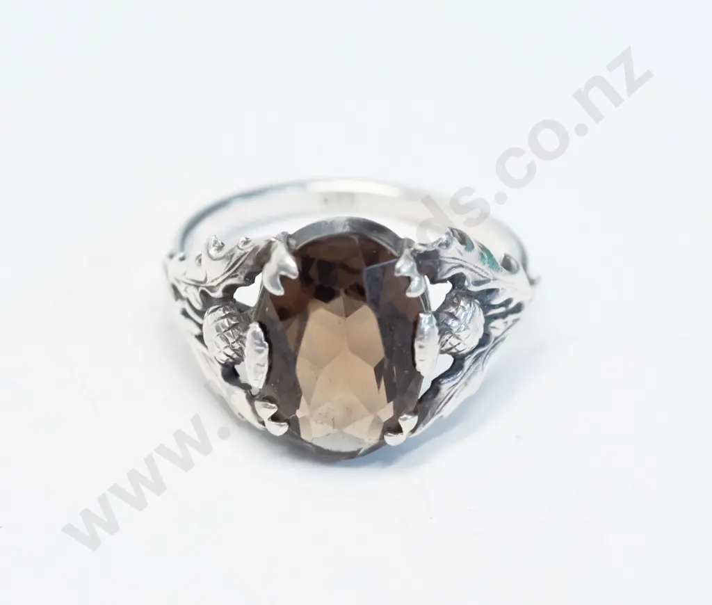 silver amber coloured stone ring with Scottish thistles on bridge stamped 925 Image 1++