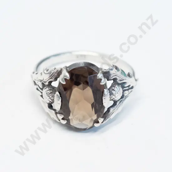 silver amber coloured stone ring with Scottish thistles on bridge stamped 925