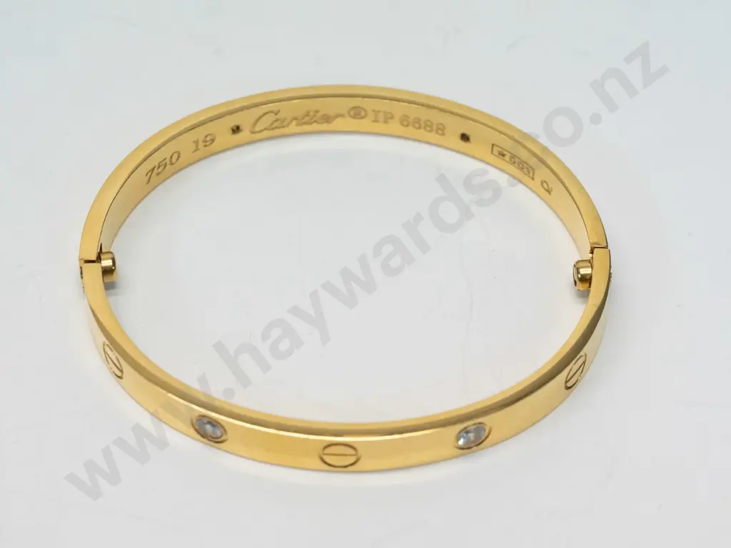 gold  bangle - stamped 750 19 Cartier IP6688 001  (not authenticated) Image 1++