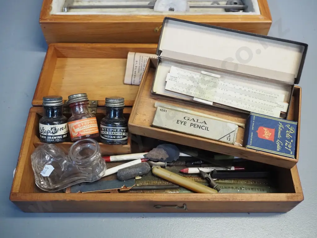 two wooden boxes: writing box with inks, glass inkwell, slide rule etc, other with circular glass cutter H100 L360 W120 Image 1++