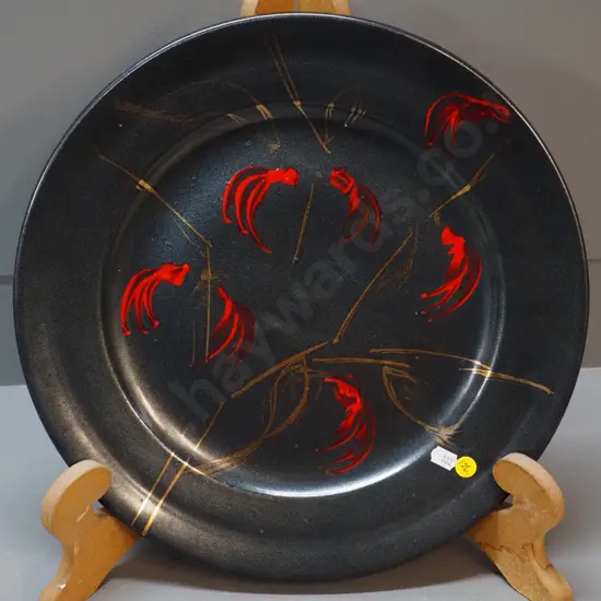Paul Laird studio pottery wall charger - under-glaze fault on back of rim D-370