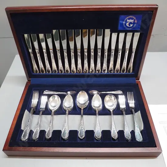 as-new mahogany canteen of Grosvenor plated cutlery - 6 place setting with 2 serving spoons