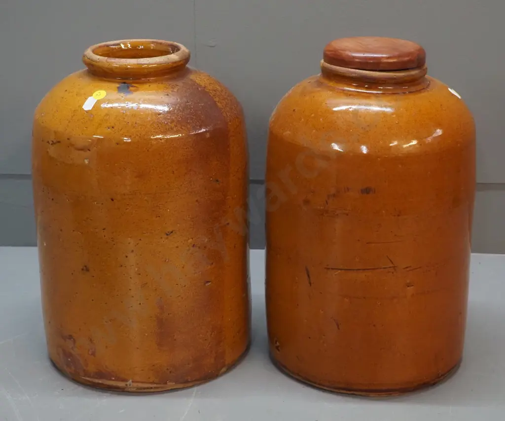 2 wide mouth stoneware crocks, one with wooden lid, both w/patching repairs around rim, one w/chip to base H-360 D-220 Image 1++