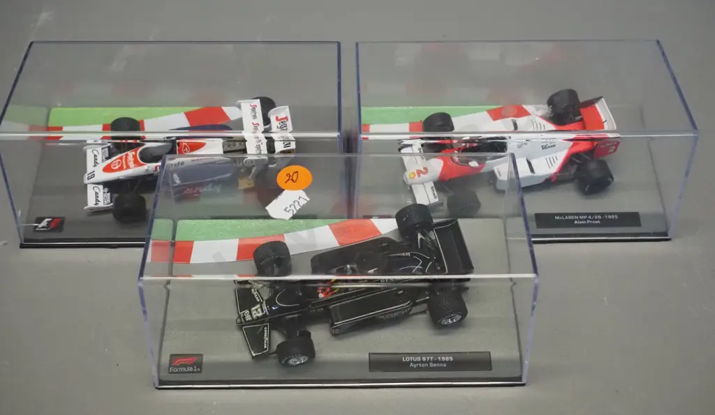 3 die-cast 1:43 scale Formula 1 racing cars - 1984 and 1985 Ayrton Senna, 1985 Alain Prost Image 1++
