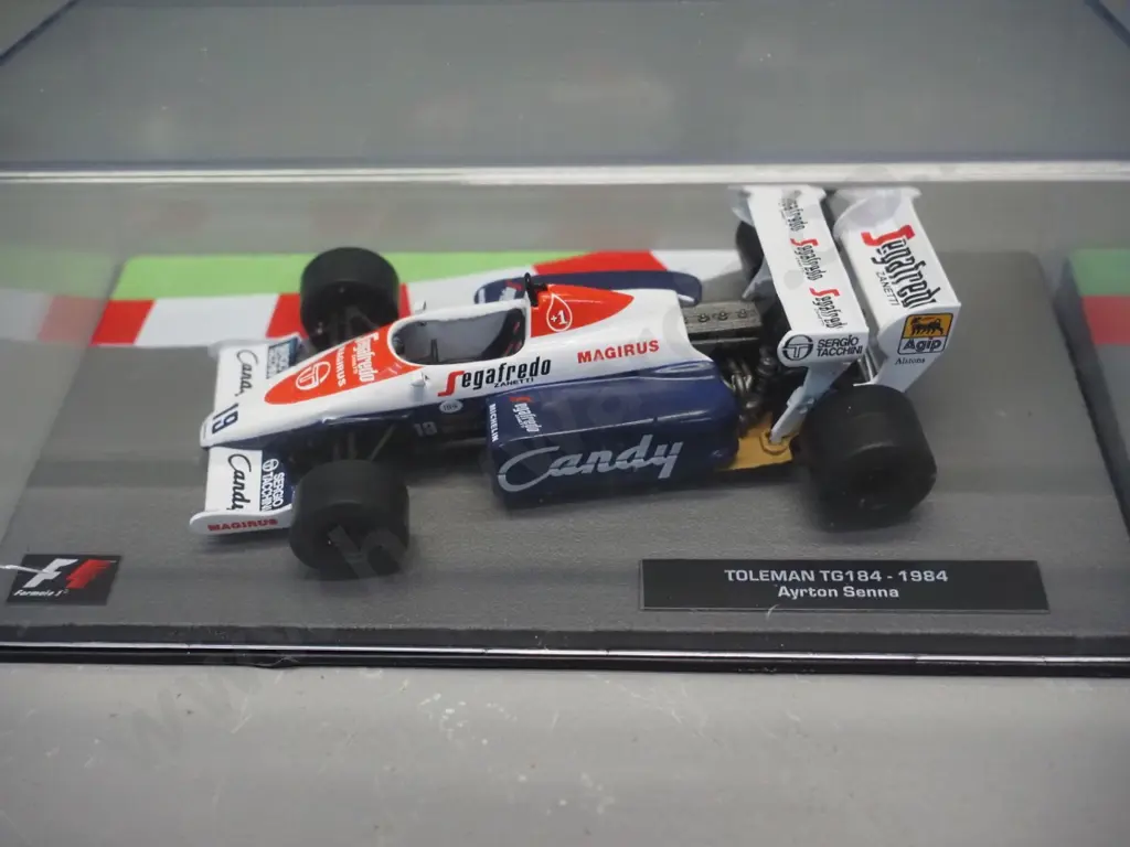 3 die-cast 1:43 scale Formula 1 racing cars - 1984 and 1985 Ayrton Senna, 1985 Alain Prost Image 1++