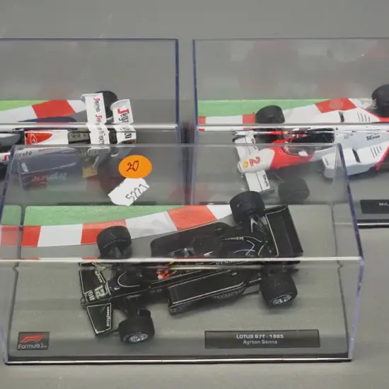 3 die-cast 1:43 scale Formula 1 racing cars - 1984 and 1985 Ayrton Senna, 1985 Alain Prost