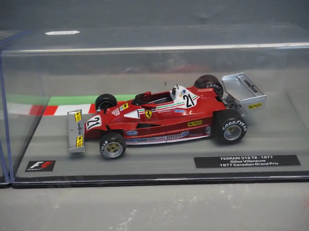 3 die-cast 1:43 scale Formula 1 racing cars - 1975 Clay Regazzoni, 1976 James Hunt, 1977 Villenueve Image 1++