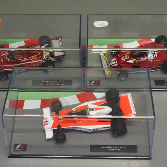 3 die-cast 1:43 scale Formula 1 racing cars - 1975 Clay Regazzoni, 1976 James Hunt, 1977 Villenueve