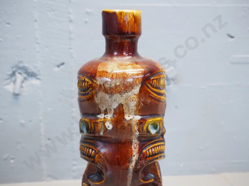 Titoki stoneware Maori tiki motif bottle, stamped 9914. H-300 Image 1++