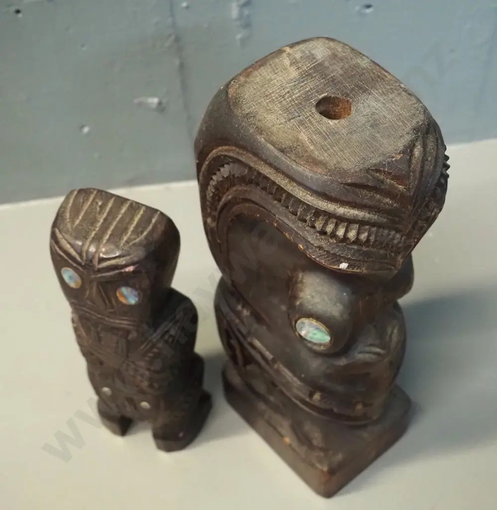 two carved wooden maori motif figures with paua inlay eyes - one with hole drilled in top is H-240 Image 1++