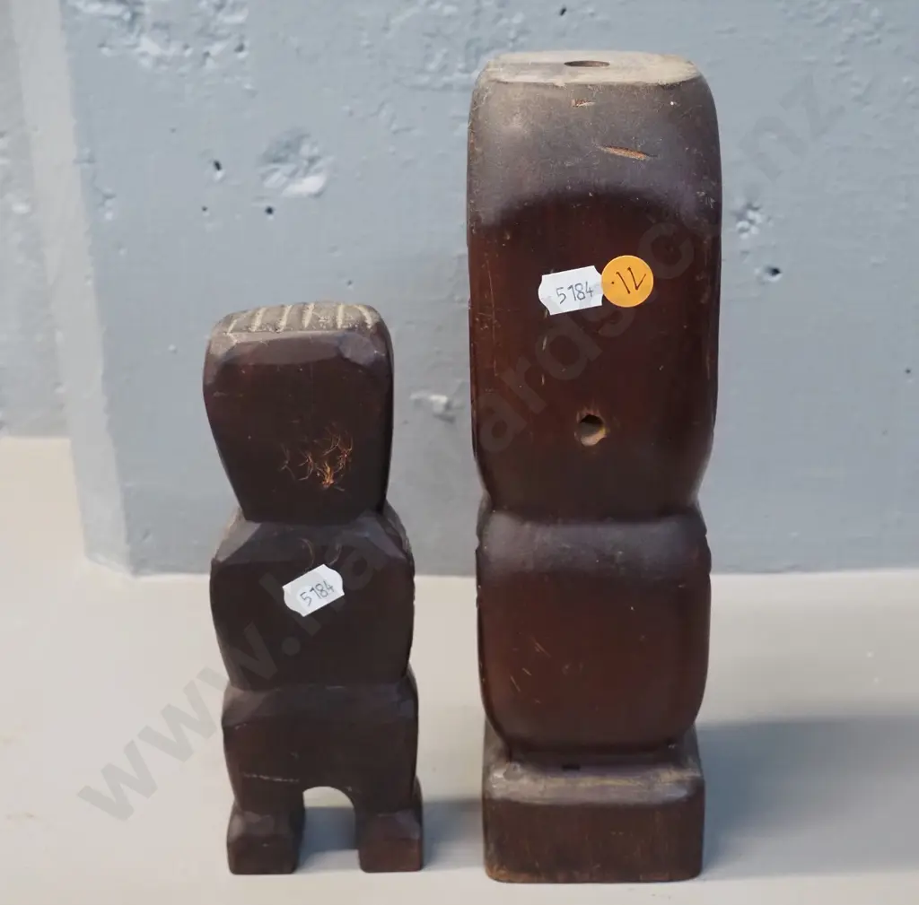 two carved wooden maori motif figures with paua inlay eyes - one with hole drilled in top is H-240 Image 1++
