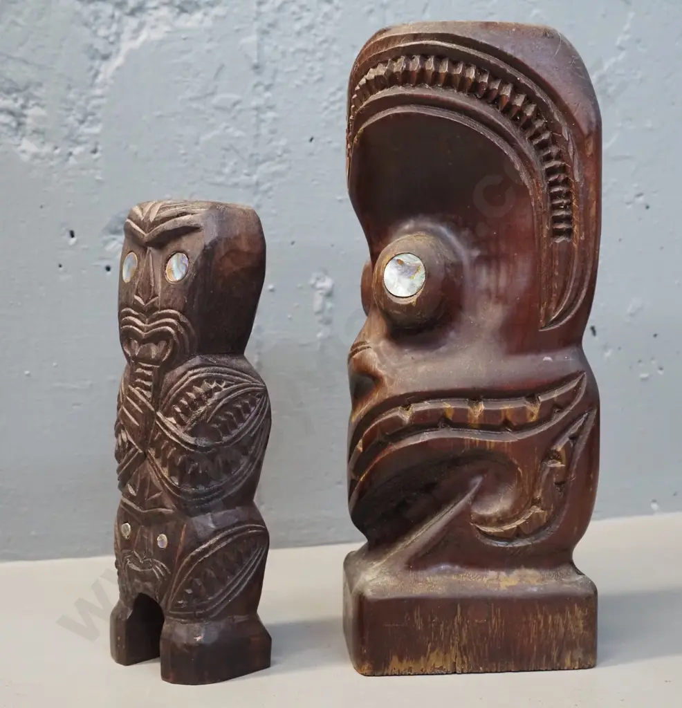 two carved wooden maori motif figures with paua inlay eyes - one with hole drilled in top is H-240 Image 1++