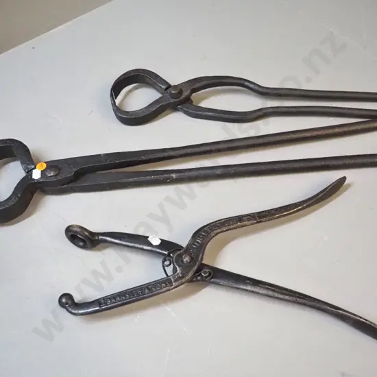 2 pairs cast iron blacksmith's tongs - larger is L-600, and spring-action pincer with ball end - leatherworking?