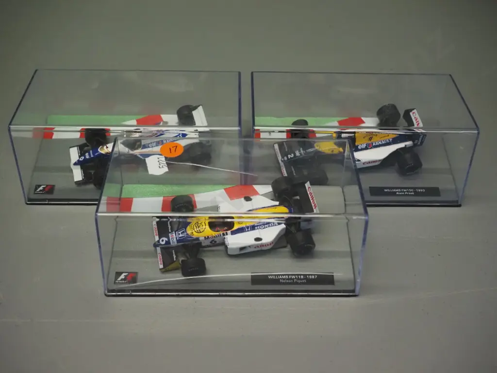 3 die-cast 1:43 scale Formula 1 racing cars - 1993 Alain Prost, 1994 Damon Hill, 1997 Nelson Piquet Image 1++