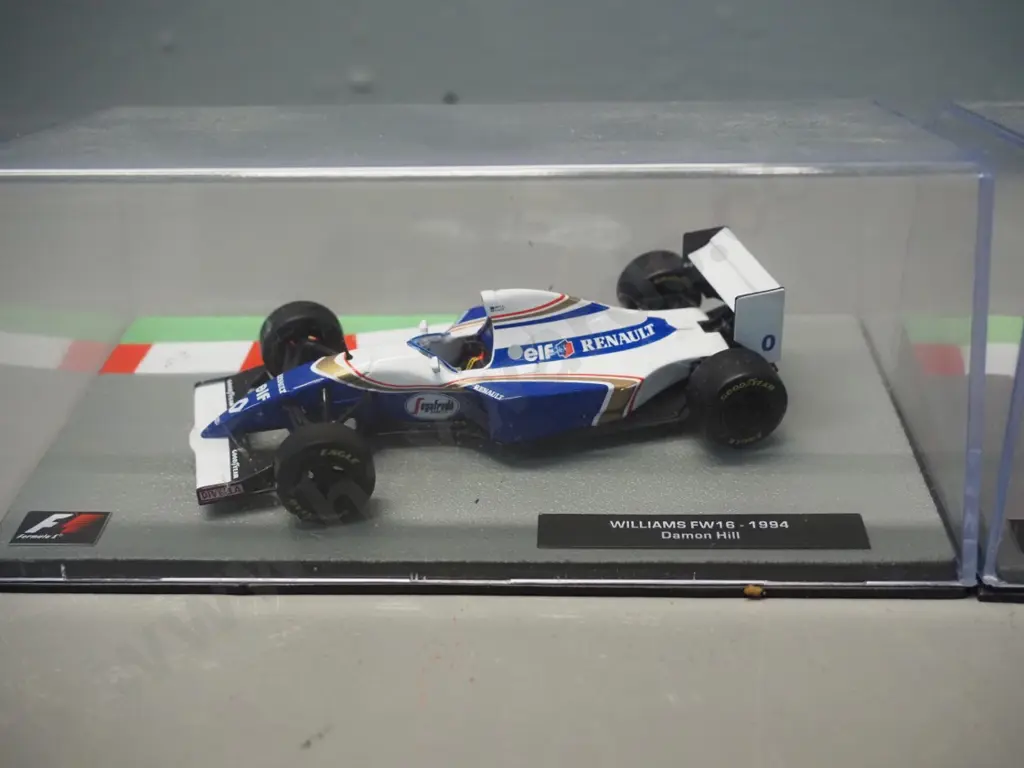 3 die-cast 1:43 scale Formula 1 racing cars - 1993 Alain Prost, 1994 Damon Hill, 1997 Nelson Piquet Image 1++