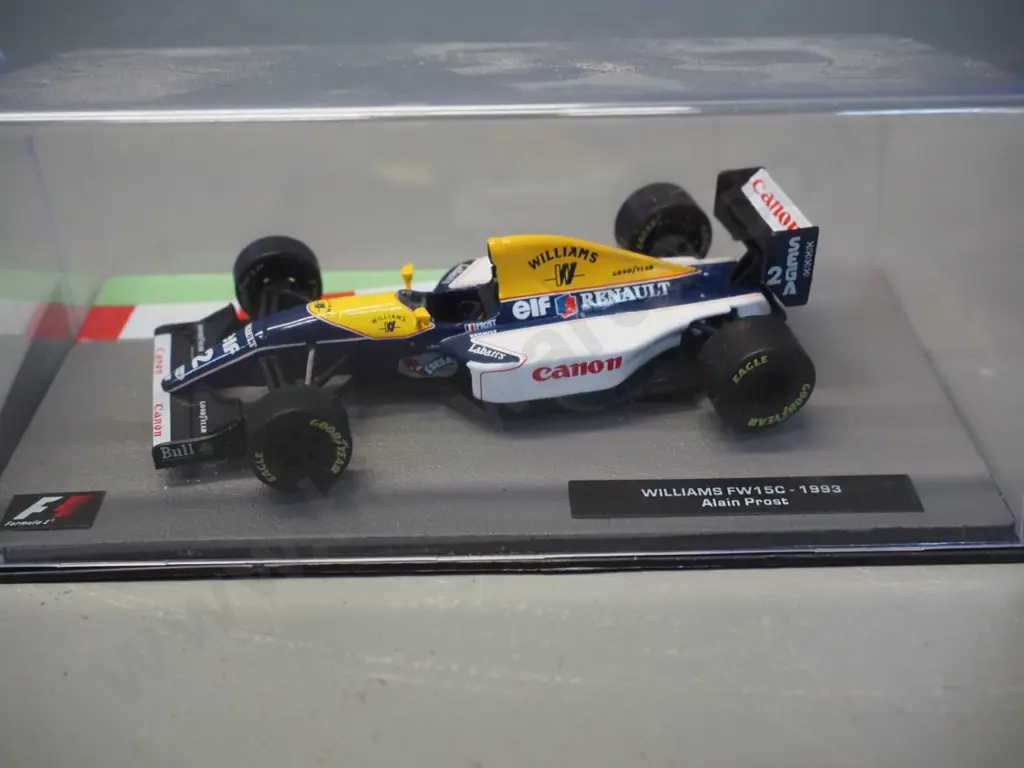 3 die-cast 1:43 scale Formula 1 racing cars - 1993 Alain Prost, 1994 Damon Hill, 1997 Nelson Piquet Image 1++